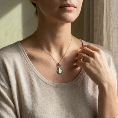 Hold the Source of Kindness pendant